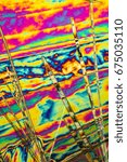 Small photo of microscopic shot of Sodium carbonate microcrystals in polarized light