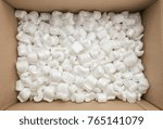 box packaging with polystyrene peanuts inside