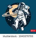 astronaut taking a photo in... | Shutterstock .eps vector #1043370703
