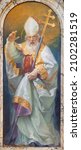 Small photo of ROME, ITALY - AUGUST 30, 2021: The painting of bishop St. Claudius in the church Chiesa dei Santi Claudio e Andrea dei Borgognoni by Cleto Luzzi (1939).