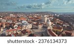 Small photo of Aerial art nouveau historical a cityscape with impressive skyscrapers and historic art nouveau buildings captured from a mesmerizing aerial perspective incity Oradea, Bihor, Romania