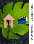 House Icon On Green Leaf With...