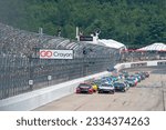 Small photo of July 17, 2023 - Loudon, NH, USA: NASCAR Cup Driver Martin Truex Jr (19) races for position for the Crayon 301 at the New Hampshire Motor Speedway in Loudon NH.