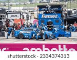 Small photo of July 17, 2023 - Loudon, NH, USA: NASCAR Cup Driver Chris Buescher (17) and crew make a pit stop for the Crayon 301 at the New Hampshire Motor Speedway in Loudon NH.