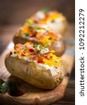 Baked Potatoes With Cheese And...