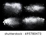 Set of dust powder splash clouds isolated on black background