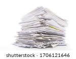 Large pile of waste paper isolated on white. Ready for recycling