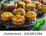 Homemade zucchini muffins with feta cheese, savory courgette with ingredients