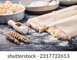 Small photo of Baking preparation of savory pie with phyllo dough sheets stuffed with feta cheese