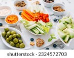 Crudites platter, raw vegetarian food or party vegetarian platter with various veggie snacks and dips