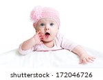 Funny Baby Girl Lying On White
