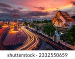 Small photo of Bangkok cityscape from roof top bar view point for Red giant swing and wat Suthat with sunset sky and city light at night the best travel point in Bangkok, Bangkok city, Thailand