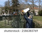 Small photo of Nova Gorica, Slovenia - April 03, 2021: Family Members Meet at Europa Square Symbol of European Open Borders that is Between Nova Gorica in Slovenia and Gorizia in Italy to exchange some words and som