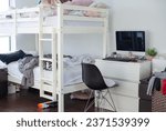 Small photo of Very messy children room with bunk bed and a computer desk and chair with dirty socks and clothes all over. Unmade beds with many disorganized toys. Dirty computer station. Unwashed clothes.