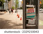 Small photo of Toronto Canada - July 8, 2023: a poster in city downtown demanding 10 permanent paid sick and calling on the government to enact meaningful legislation that ensures it