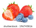Strawberries and blueberries on white background 