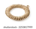 Small photo of A potsherd made of straw on a white background. Craftwork.