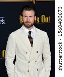 Small photo of LOS ANGELES, USA. November 15, 2019: Chris Evans at the premiere of "Knives Out" at the Regency Village Theatre. Picture: Paul Smith/Featureflash