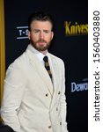 Small photo of LOS ANGELES, USA. November 15, 2019: Chris Evans at the premiere of "Knives Out" at the Regency Village Theatre. Picture: Paul Smith/Featureflash