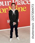 Small photo of LOS ANGELES, CA. February 02, 2023: Tanner Swagger at the premiere for "Your Place or Mine" at the Regency Village Theatre. Picture: Paul Smith-Featureflash