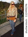 Small photo of Paris Hilton at Samsung and Sprint "The Upstage" Country Club. Private Location, Beverly Hills, CA. 04-15-07