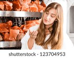 Wellness - Young woman inhaling essential oil in salt cave of a Spa