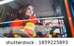 Small photo of Team of fire fighters driving to an operation using radio