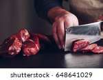 Butcher hands close up: cutting meet
