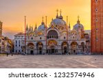 View of Basilica di San Marco and on piazza San Marco in Venice, Italy. Architecture and landmark of Venice. Sunrise cityscape of Venice.