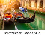 Canal With Two Gondolas In...