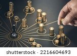 Small photo of Man puting golden coins on a board representing multiple streams of income. Concept of multiplying sources of revenue. Composite image between a 3d illustration and a photography.