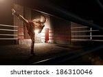 Young  Man Kickboxing In The...
