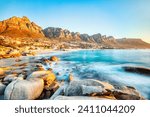 Small photo of Cape Town Sunset over Camps Bay Beach with Table Mountain and Twelve Apostles in the Background, South Africa