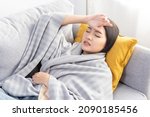 asian woman touch her forehead... | Shutterstock . vector #2090185456