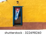 Cuban Flag Hanging On A Door In ...