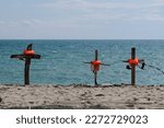 Small photo of Cutro, Crotone, Italy, 5 March 2023, Crucifix in the beach of Steccato di Cutro in memory of tragic Shipwreck where over 70 people migrants dead on 2023.