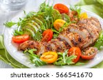 Healthy food. Salad plate with colorful tomatoes, chicken breast and avocado