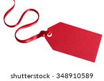 Gift Tag Tied With Red Ribbon