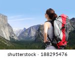 Travel in Yosemite Park, Woman Hiker with backpack enjoying view, California, USA 