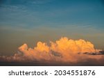 dramatic clouds lit by the sun... | Shutterstock . vector #2034551876