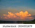 dramatic clouds lit by the sun... | Shutterstock . vector #2034551879