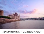 The Hungarian Parliament Building on the bank of the Danube in Budapest at sunset time.