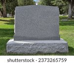 Blank gray granite tombstone in ...