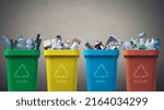 Small photo of Collection of waste bins full of different types of garbage, recycling and separate waste collection concept