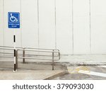 Wheelchair ramp sign on public 