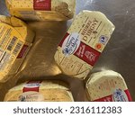 Small photo of BANGKOK, THAILAND- JUNE 12, 2023: Close up butter roll of 'Isigny Ste Mere' famous specialty dairy product from Normandy, France