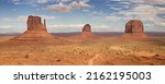 Panorama of the Mittens and Merrick Butte in Monument Valley, Arizona, United States.