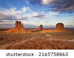 The Mittens and Merrick Butte at dusk, Monument Valley, Arizona, United States.