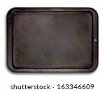 Top view of a used baking tray isolated on white for use in layouts and illustrations