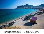 Nudist beach in the summer at Koktebel in Crimea in the summer